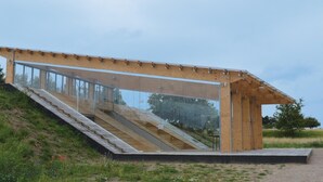 A modern building with a wooden exterior and large glass windows. - Lovely home in Kalundborg with kitchen (Kalundborg)