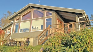 A modern house with large windows, a wooden staircase, and a metal antenna. - Beautiful home in Smålandsstenar (Smålandsstenar)