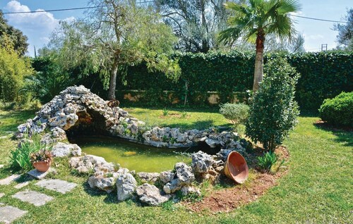 Awesome home in Biniali with WiFi