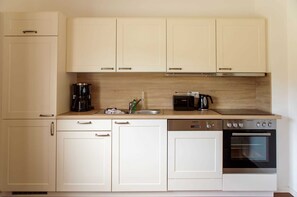 Fridge, oven, dishwasher, high chair