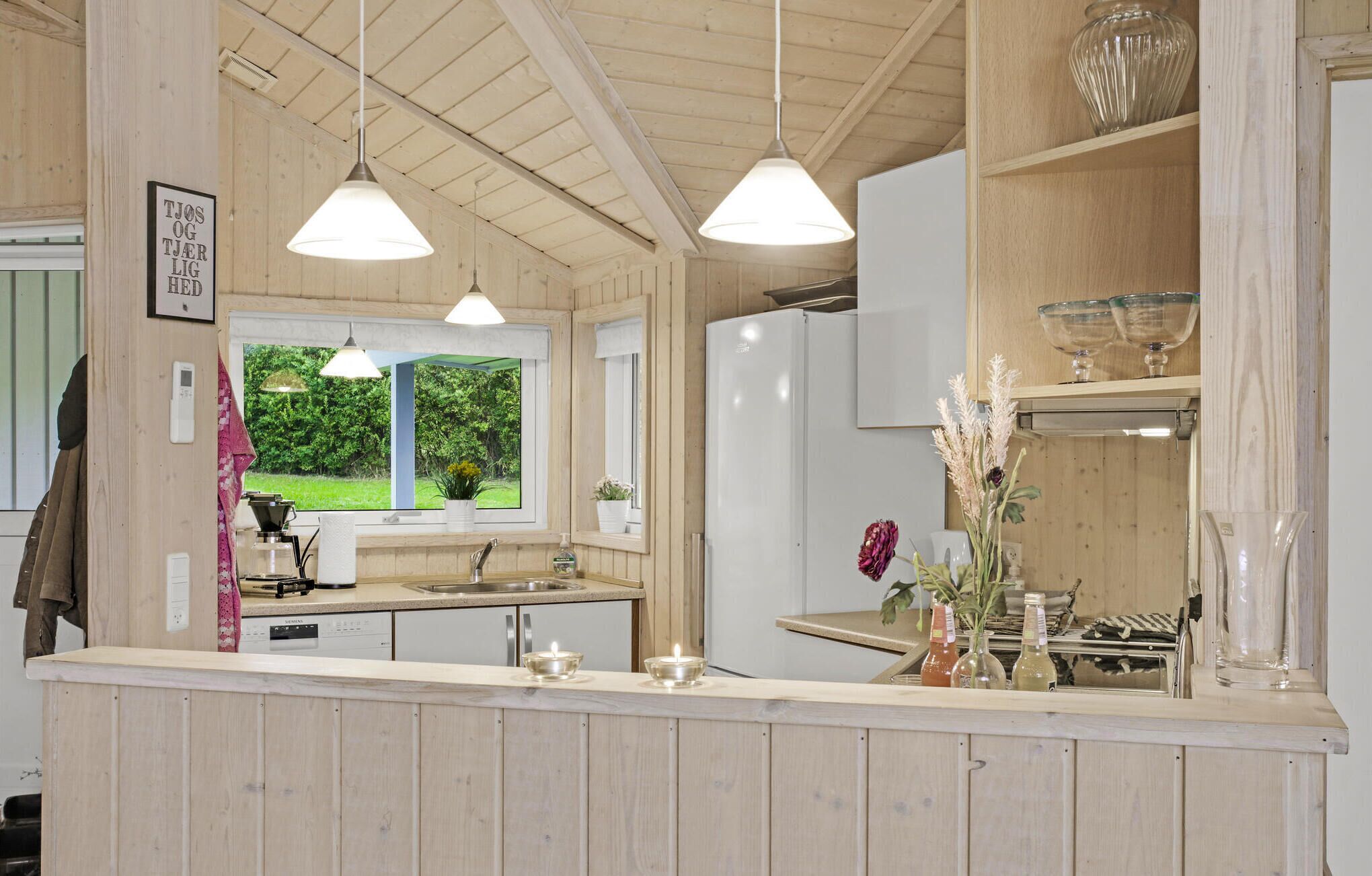 Fridge, stovetop, dishwasher, coffee/tea maker