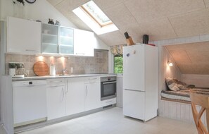 Fridge, stovetop, dishwasher, coffee/tea maker