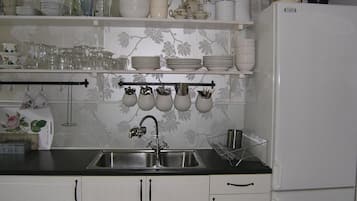 Geladeira, cooktop, lava-louças, cafeteira/chaleira