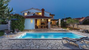 A two-story house with a swimming pool, outdoor seating, and a barbecue area. - Lovely home in Golubovo (Golubovo)