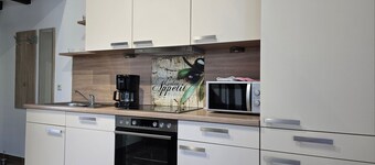 Ferienwohnung Schwimmendes Haus - Ferienwohnungen Am alten Backhaus