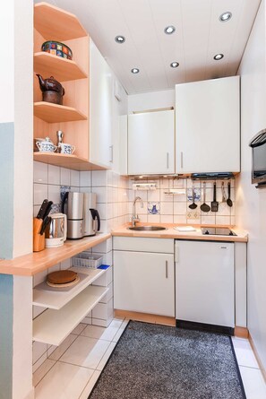 Fridge, microwave, coffee/tea maker, electric kettle
