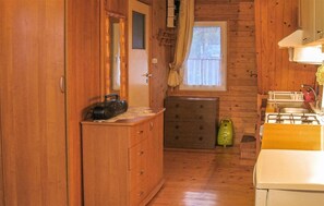Fridge, stovetop, dishwasher, coffee/tea maker