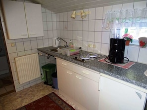 Fridge, coffee/tea maker, electric kettle, toaster