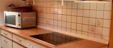 Fridge, microwave, high chair