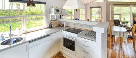 Fridge, stovetop, dishwasher, coffee/tea maker