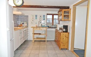 Fridge, stovetop, coffee/tea maker