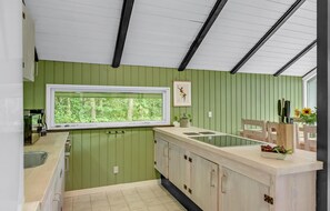 Fridge, stovetop, dishwasher, coffee/tea maker