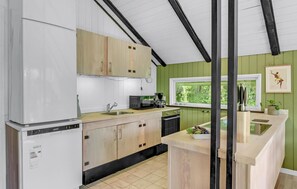 Fridge, stovetop, dishwasher, coffee/tea maker