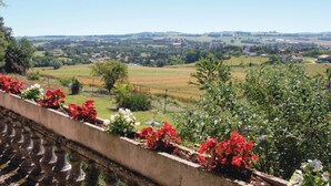 A rural landscape with fields, trees, and a distant village. - Gorgeous home in Lavardac with kitchen (Lavardac)