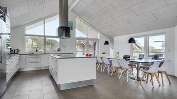 Fridge, stovetop, dishwasher, coffee/tea maker