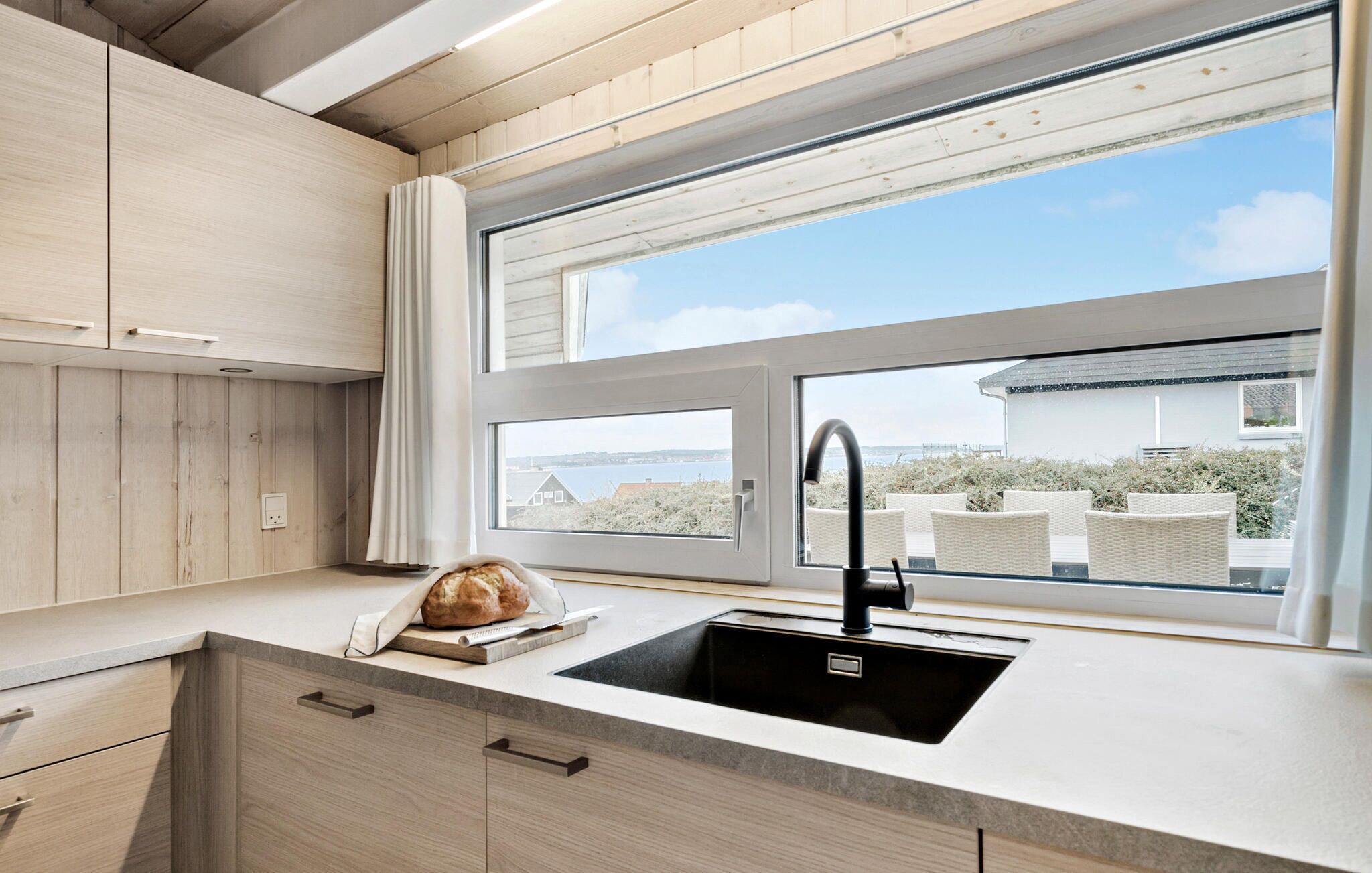 Fridge, stovetop, dishwasher, coffee/tea maker