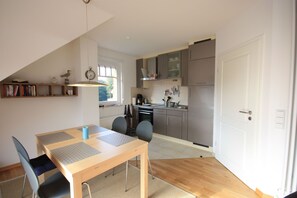 Fridge, oven, dishwasher, high chair