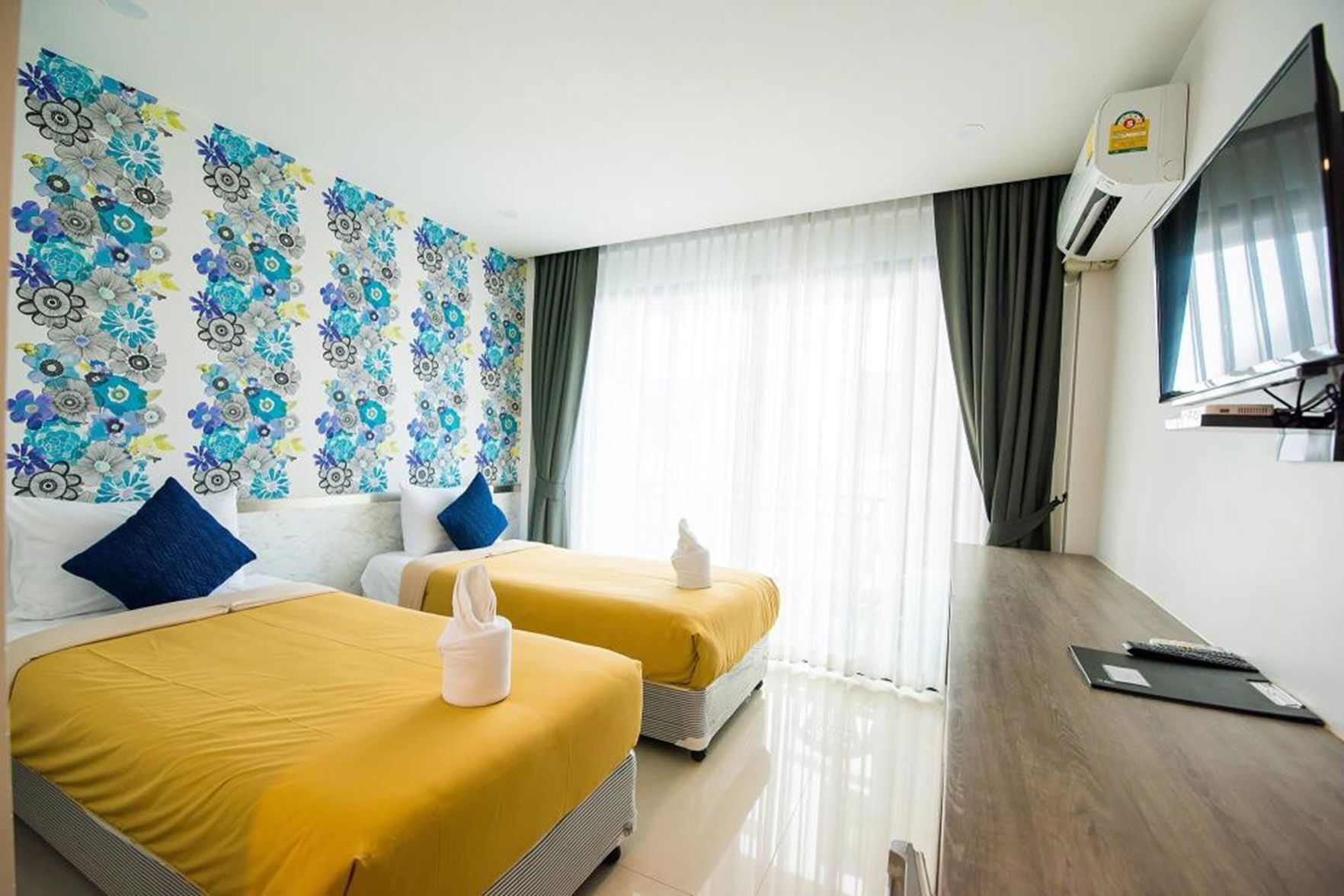 Een kluis op de kamer, verduisterende gordijnen, extra bedden