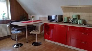 Fridge, microwave, dishwasher, high chair