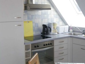 Geladeira, fogão, lava-louças