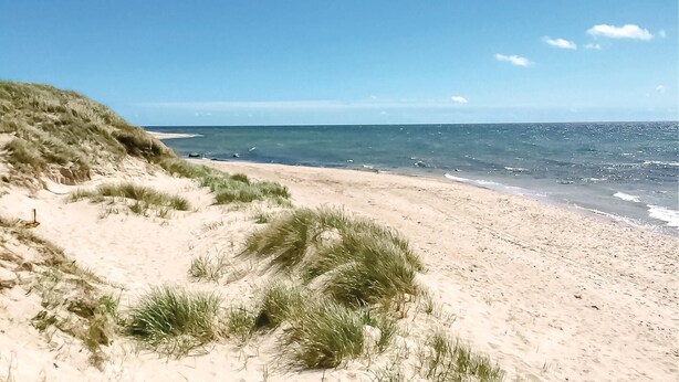 A beach with sand dunes and the ocean. - Nice home in Aakirkeby with WiFi (Aakirkeby)