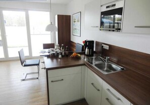 Fridge, microwave, coffee/tea maker, electric kettle