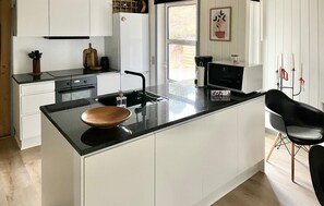 Frigorifero, piano cottura, lavastoviglie, macchina per tè/caffè