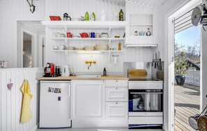 Fridge, stovetop, coffee/tea maker, cookware/dishes/utensils