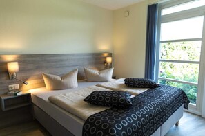 2 bedrooms, travel crib, WiFi, bed sheets