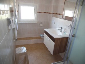 Hair dryer, towels, soap, toilet paper