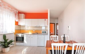 Fridge, stovetop, coffee/tea maker