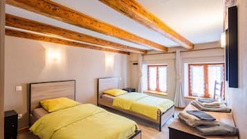 2 dormitoris, un bressol de viatge, wifi gratuïta i roba de llit