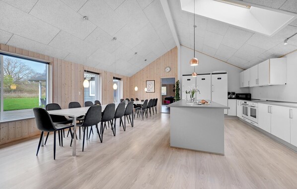 Fridge, stovetop, dishwasher, coffee/tea maker