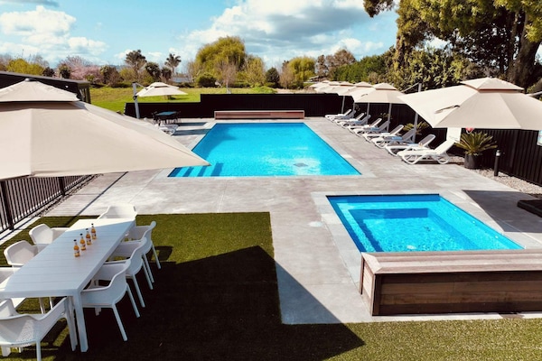 Outdoor pool, open 9:00 AM to 7:00 PM, pool umbrellas, pool loungers