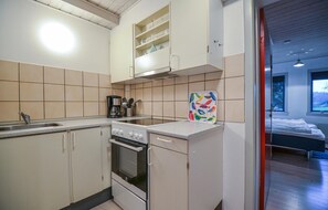 Fridge, stovetop, coffee/tea maker, cookware/dishes/utensils