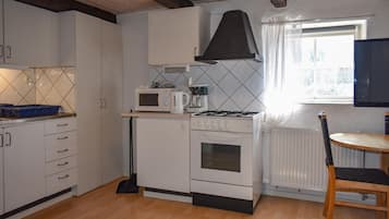 Fridge, stovetop, coffee/tea maker, cookware/dishes/utensils