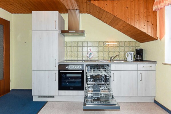 Fridge, coffee/tea maker, electric kettle, toaster