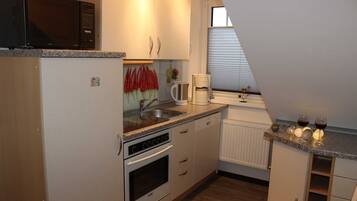 Refrigerador, microondas, horno y lavavajillas