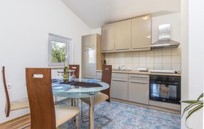 Fridge, stovetop, coffee/tea maker