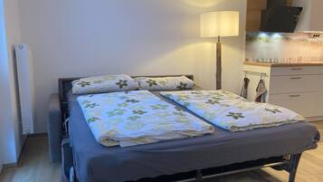 2 bedrooms, travel crib, WiFi, bed sheets