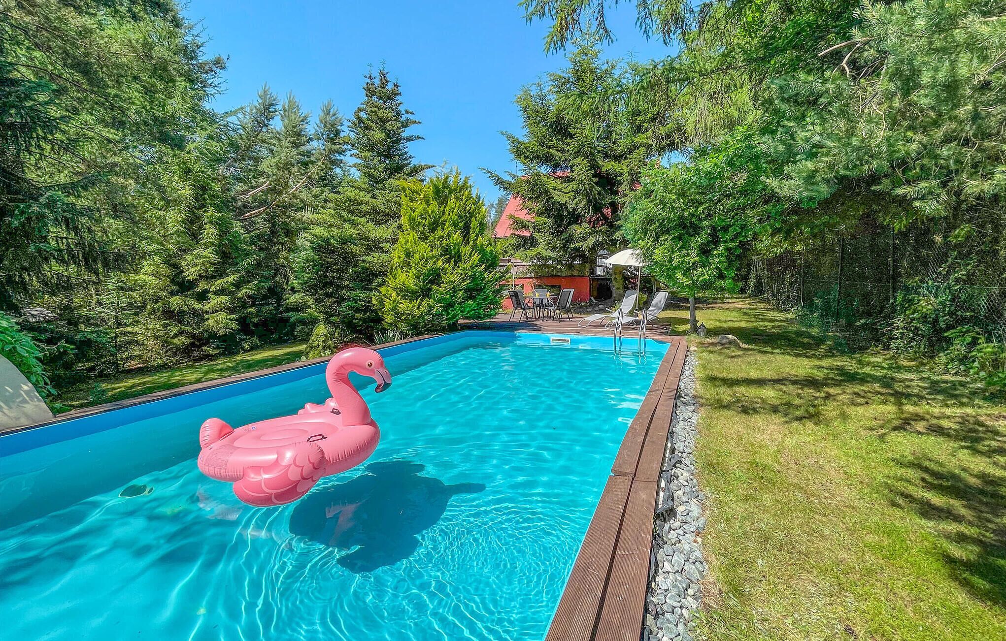 Large, practically furnished vacation home with 2 balconies and pool.