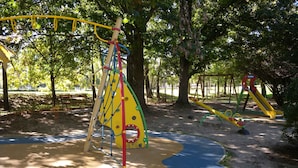 A playground with climbing structures and slides. - Holiday apartment only 150 m from the spa (Zalakaros)