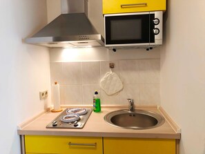 Fridge, microwave, electric kettle, toaster