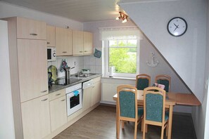 Fridge, dishwasher, high chair