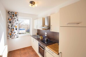 Fridge, oven, dishwasher, high chair