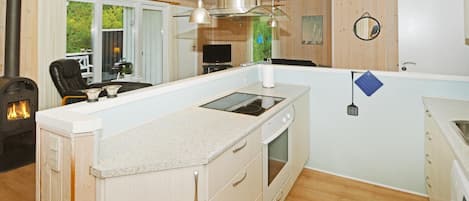 Fridge, stovetop, dishwasher, coffee/tea maker