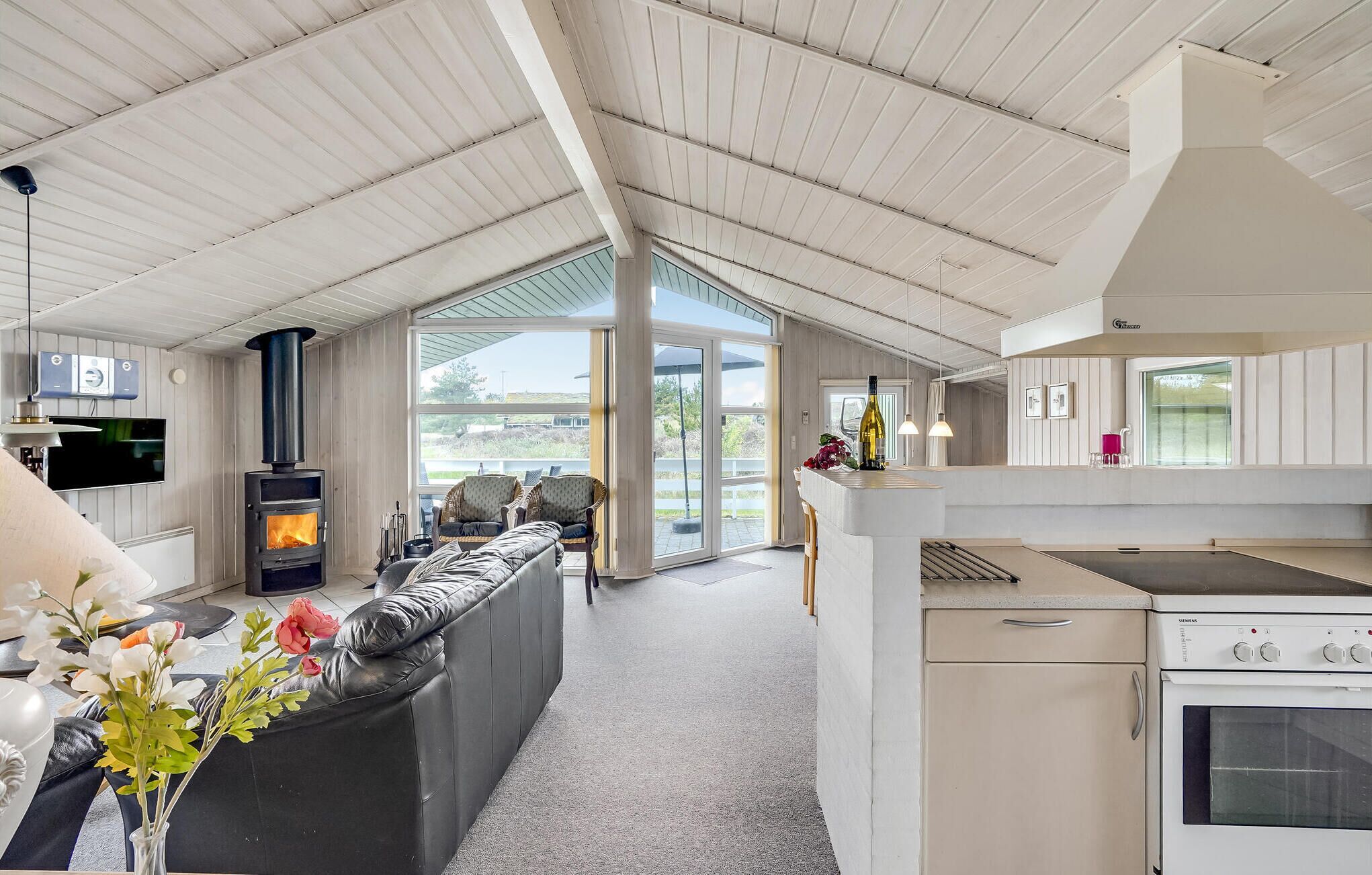 Fridge, stovetop, dishwasher, coffee/tea maker