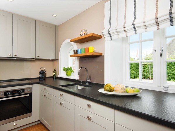 Fridge, oven, dishwasher, coffee/tea maker