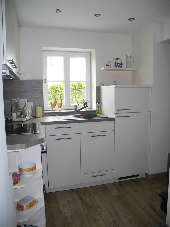 Fridge, oven, dishwasher, high chair