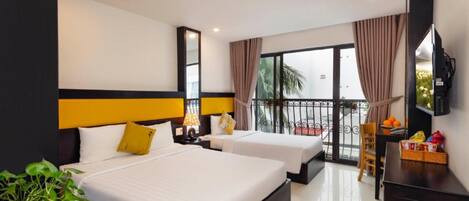 Family Triple Room, Balcony | In-room safe, desk, soundproofing, free WiFi